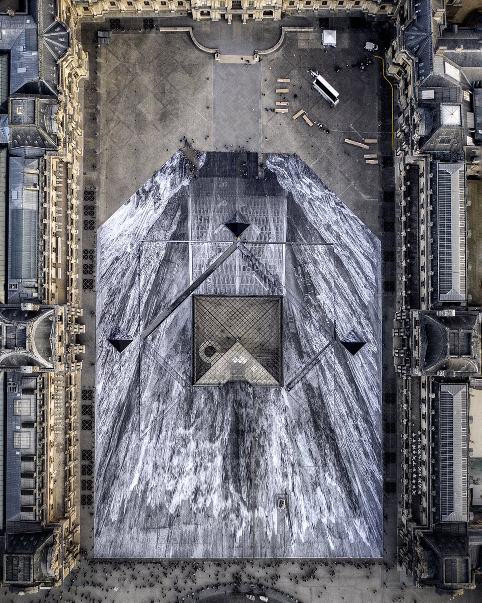 Artist JR Transforms the Louvre With a 2000-Piece Paper Optical Illusion