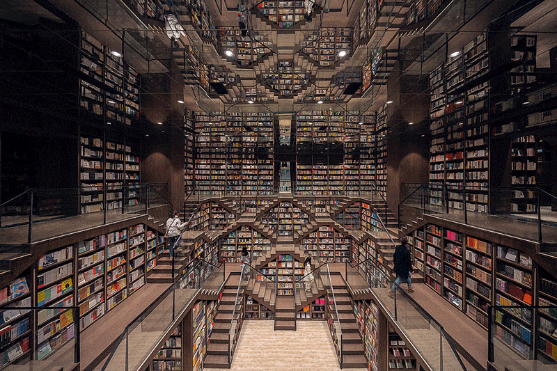 Mirrored Ceilings and Criss-Crossed Stairwells Give a Chinese Bookstore the Feeling of an M.C. Escher Woodcut