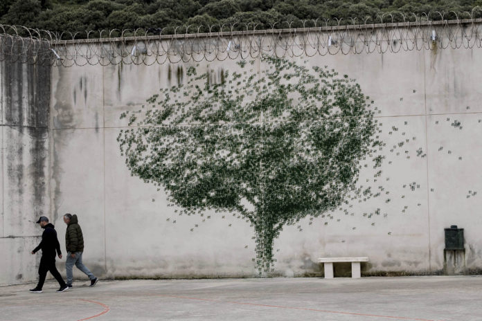 Pejac Partners with Inmates to Transform a Prison Into a Gold Mine