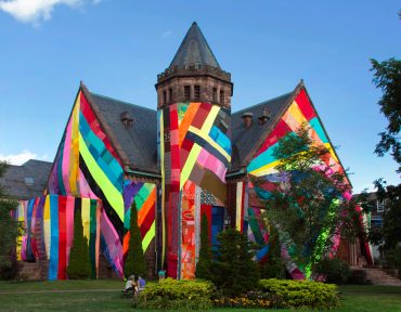 Enormous Panels of Patchworked Fabric Give Colorful Temporary Makeovers to Public Buildings