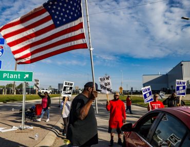 One week in, strikers worried, determined