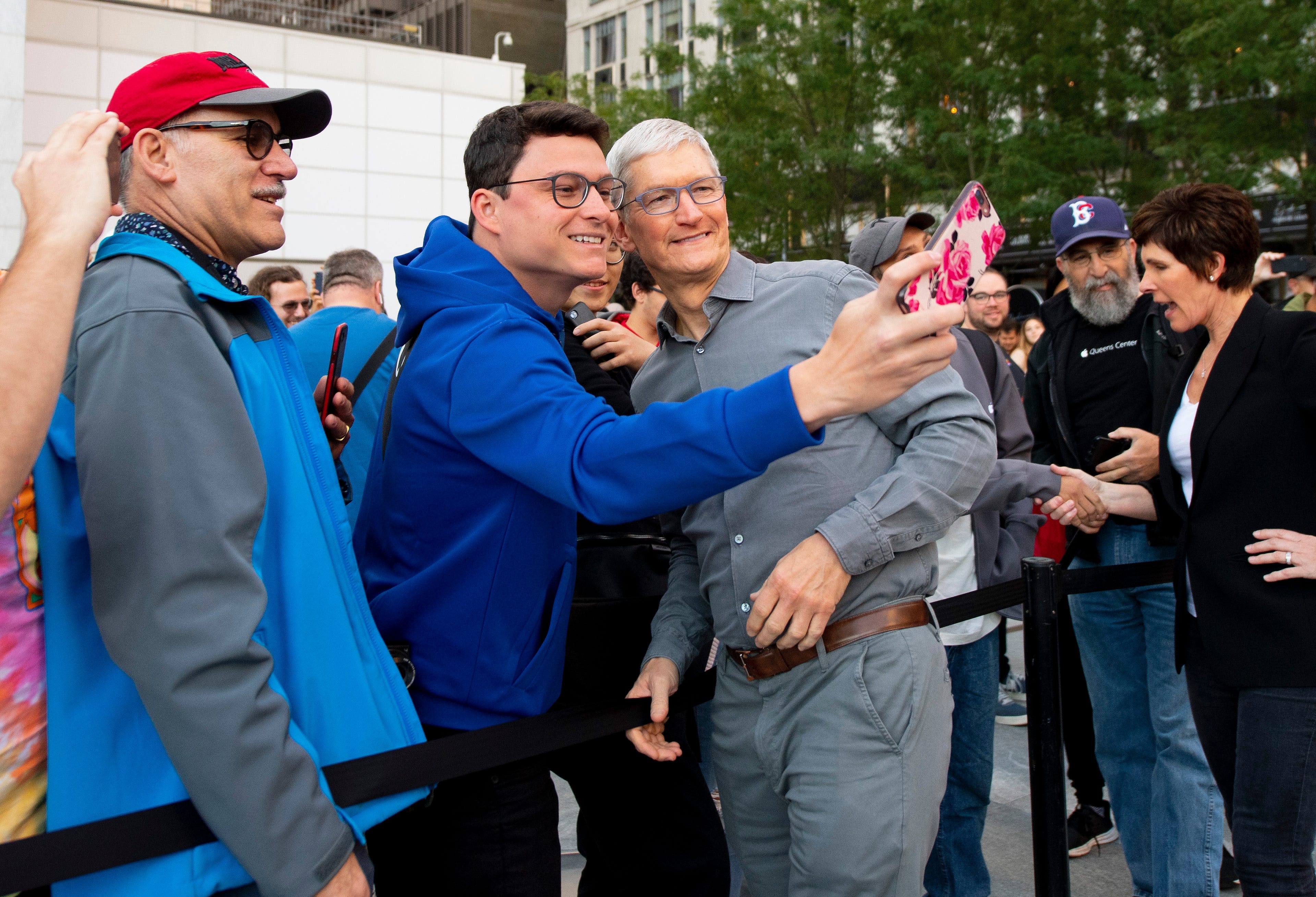 iPhone 11 goes on sale as Tim Cook greets early buyers at NYC store