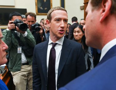 Facebook bans Qanon ads, includes militarized social movements