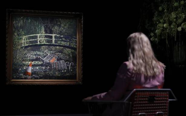 Banksy artwork sells for almost $10 million at auction
